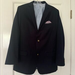 Tommy Hilfiger navy blazer, boy size 20. Excellent condition.